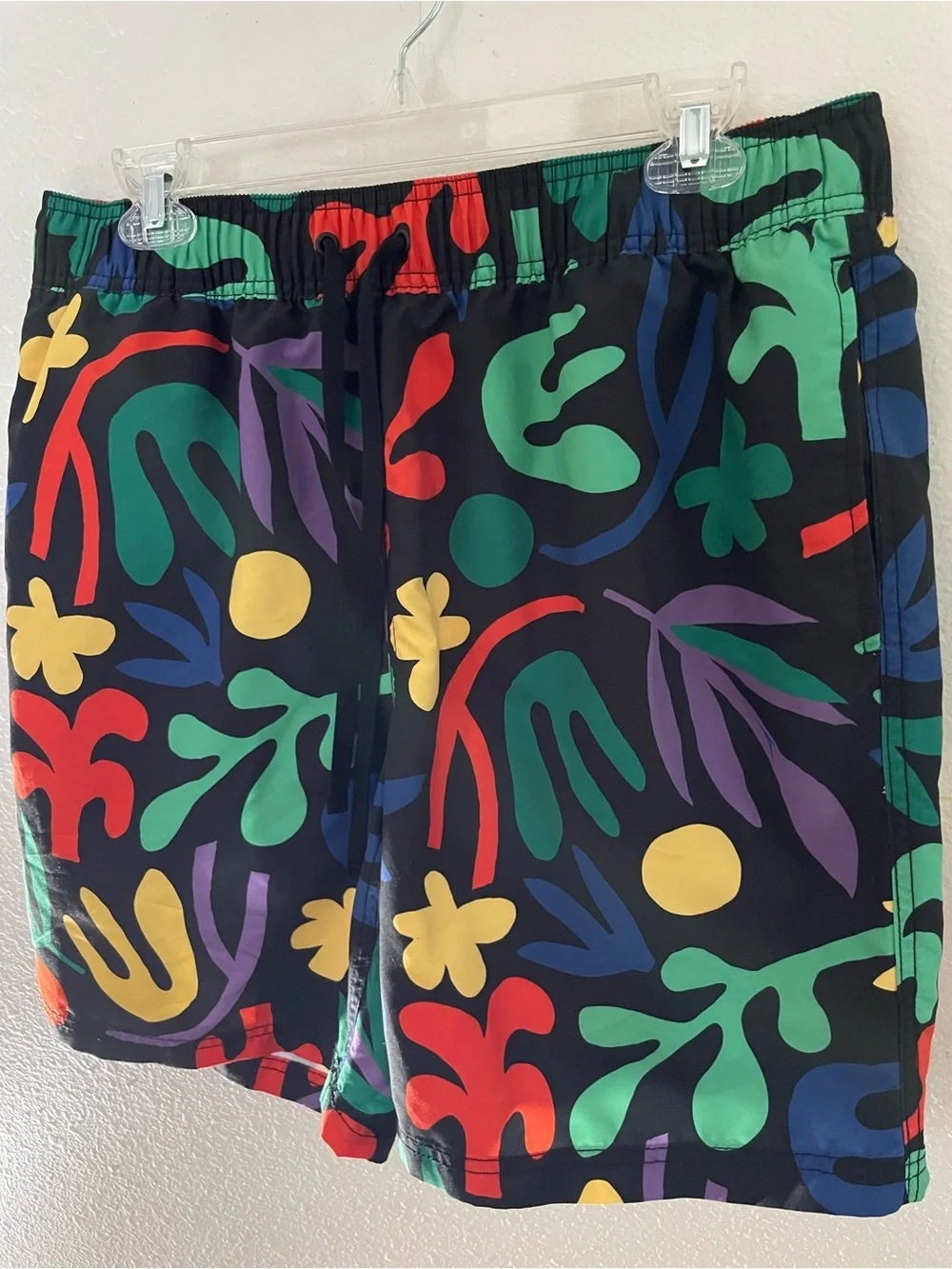 Hanna Andersson Black Swim Shorts with Bold Multicolor Abstract Print